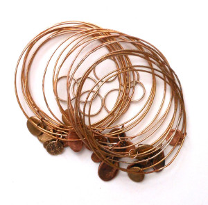 etched bronze bracelets and rings