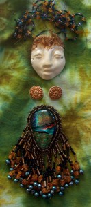 tie dyed cloth ceramic glass and beads for spirit doll