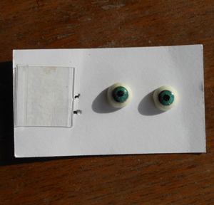 polymer clay eyes on business card